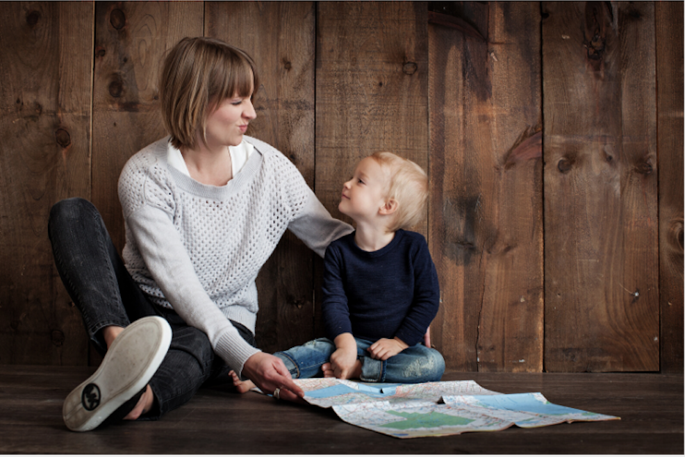 Mother play and read with child