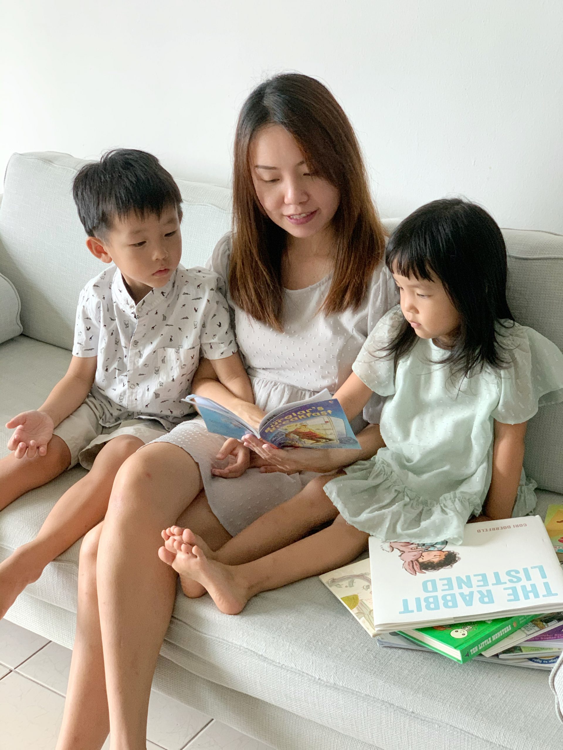 parenting coaching reading books to two children